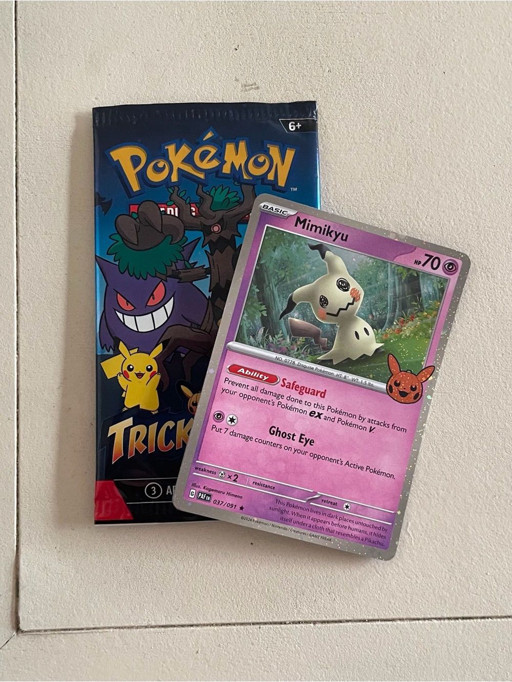 Pokémon Mimikyu Holographic Trading Card